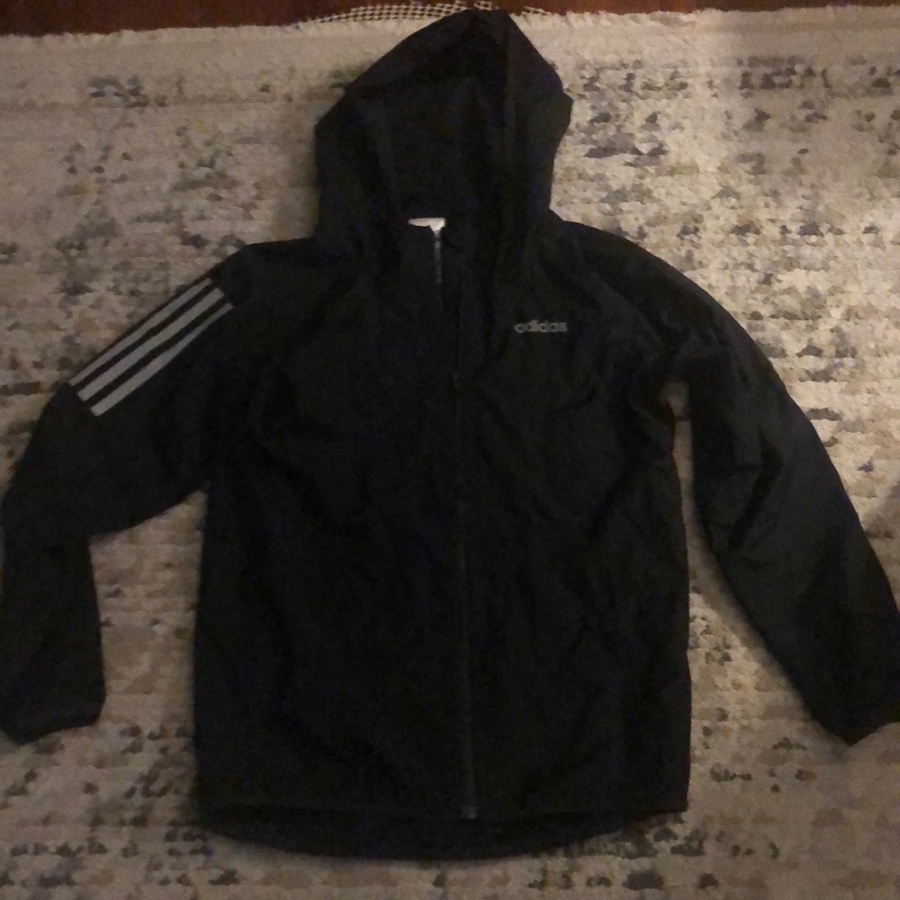 Adidas boys black rain coat. Size medium 10/12